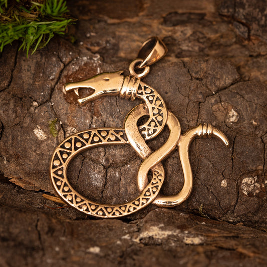 Orm med ornamenthänge i brons – bild 1